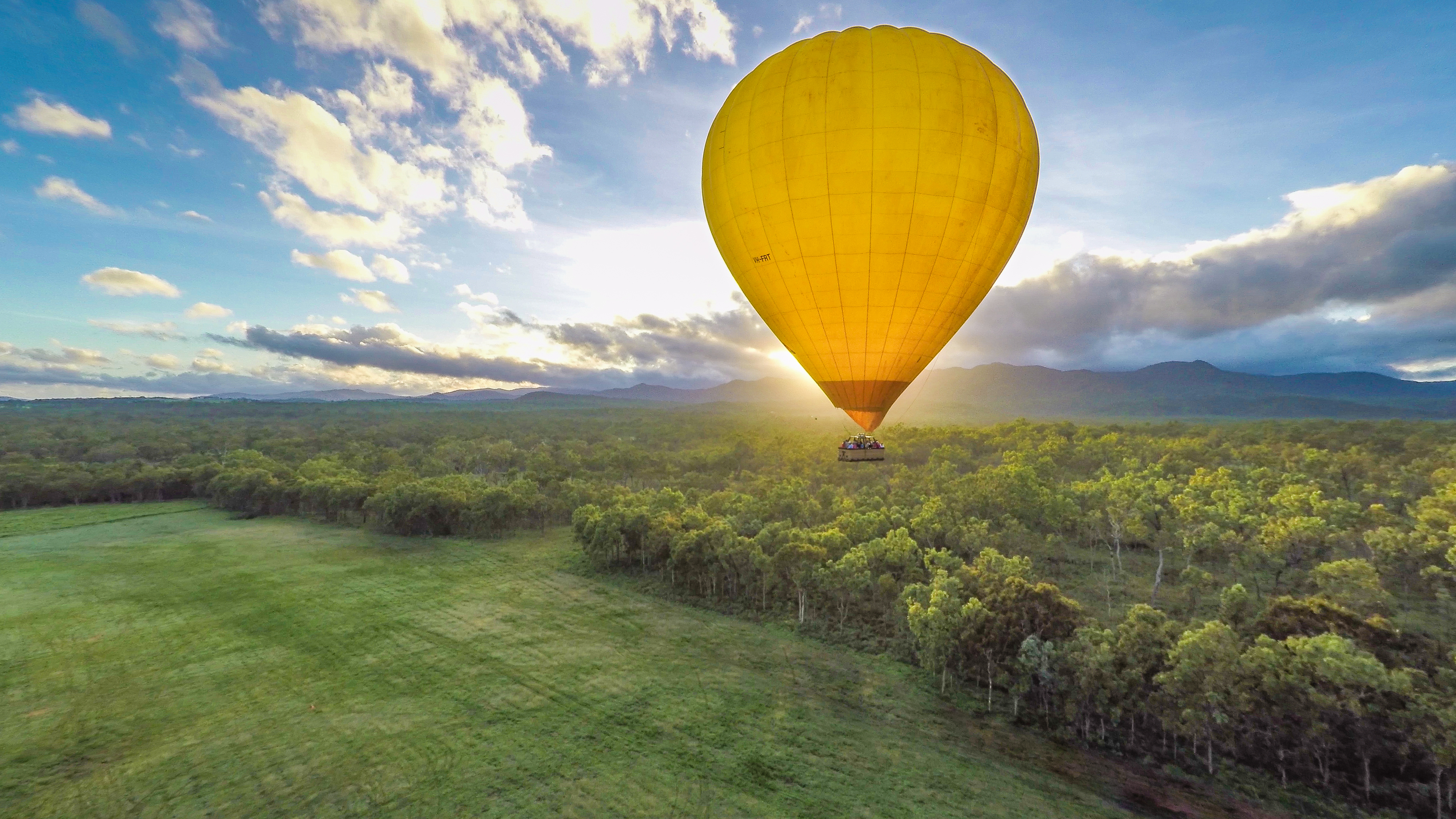 Sunrise Hot Air Balloon Flight near Cairns with Sparkling Wine and Optional Round Trip Transfer
